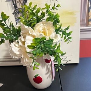 Apple vase with faux flowers and greenery